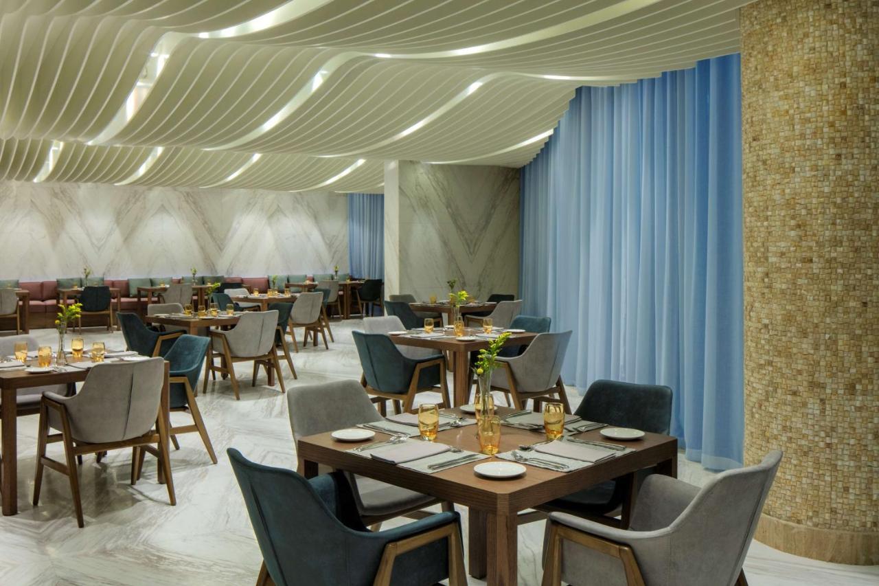 Radisson Blu Hotel Apartment Dubai Silicon Oasis Exterior photo